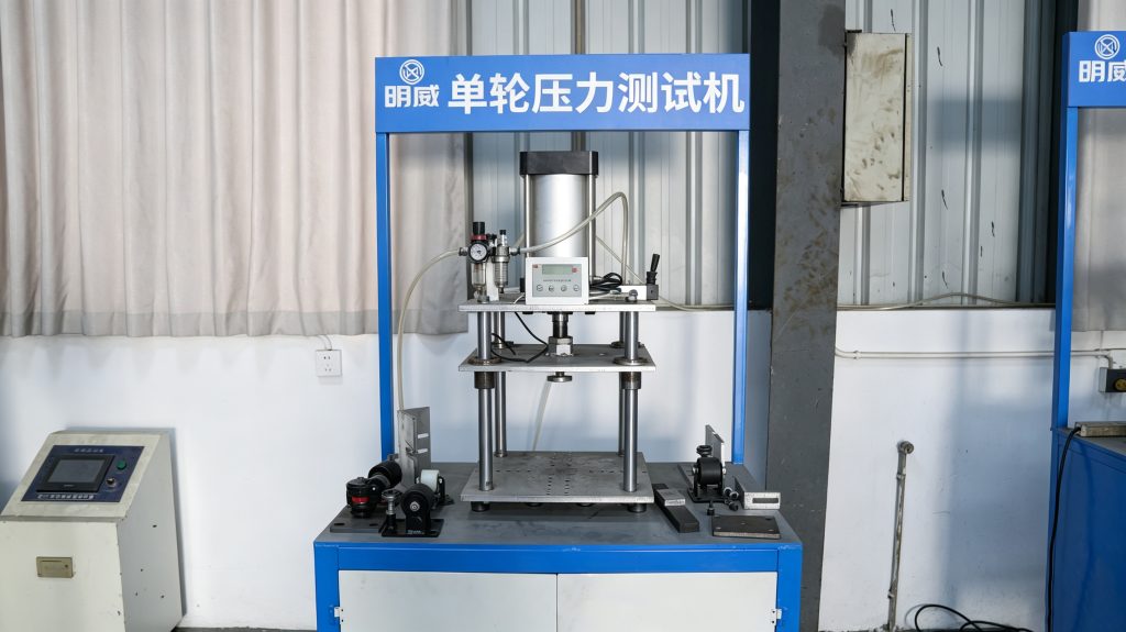 Single wheel pressure testing machine